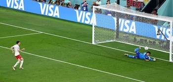 Soccer Football - FIFA World Cup Qatar 2022 - Group C - Mexico v Poland - Stadium 974, Doha, Qatar - November 22, 2022 Poland's Robert Lewandowski has his penalty saved by Mexico's Guillermo Ochoa REUTERS/Marko Djurica TPX IMAGES OF THE DAY