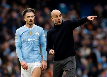 Jack Grealish y Pep Guardiola