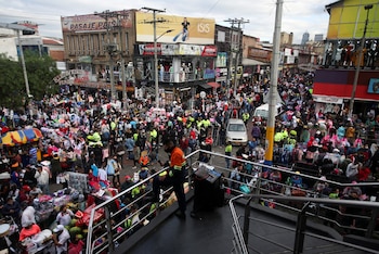 People walk through the commercial