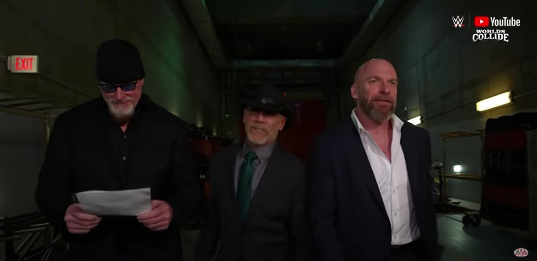 Aclertaker, Shawn Micheals e Triple H com o início do meio ambiente. (Pegue a tela)