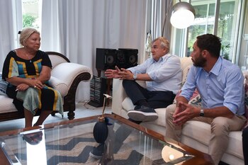 Carrió con Morales y economistas