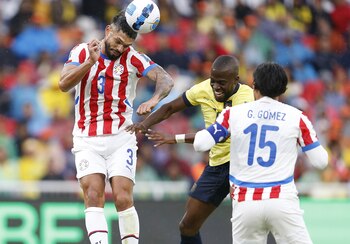 Paraguay's Omar Alderete heads the