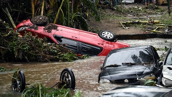Hubo inundaciones en Río de Janeiro (Photo by MAURO PIMENTEL / AFP)
