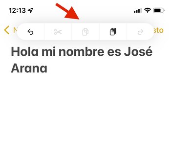 Colocar tres dedos en iPhone