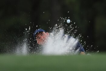 Golf - The Masters - Augusta National Golf Club - Augusta, Georgia, U.S. - April 8, 2022 Scottie Scheffler of the U.S. plays out of a bunker on the 17th during the second round REUTERS/Mike Segar