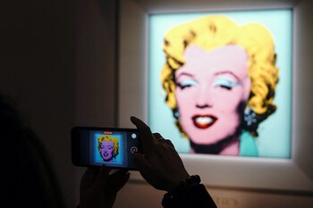 Andy Warhol's "Shot Sage Blue Marilyn", a painting of Marilyn Monroe, is pictured on display at Christie's Auction House in advance of the piece going up for auction in the Manhattan borough of New York City, New York, U.S., March 21, 2022. REUTERS/Carlo Allegri