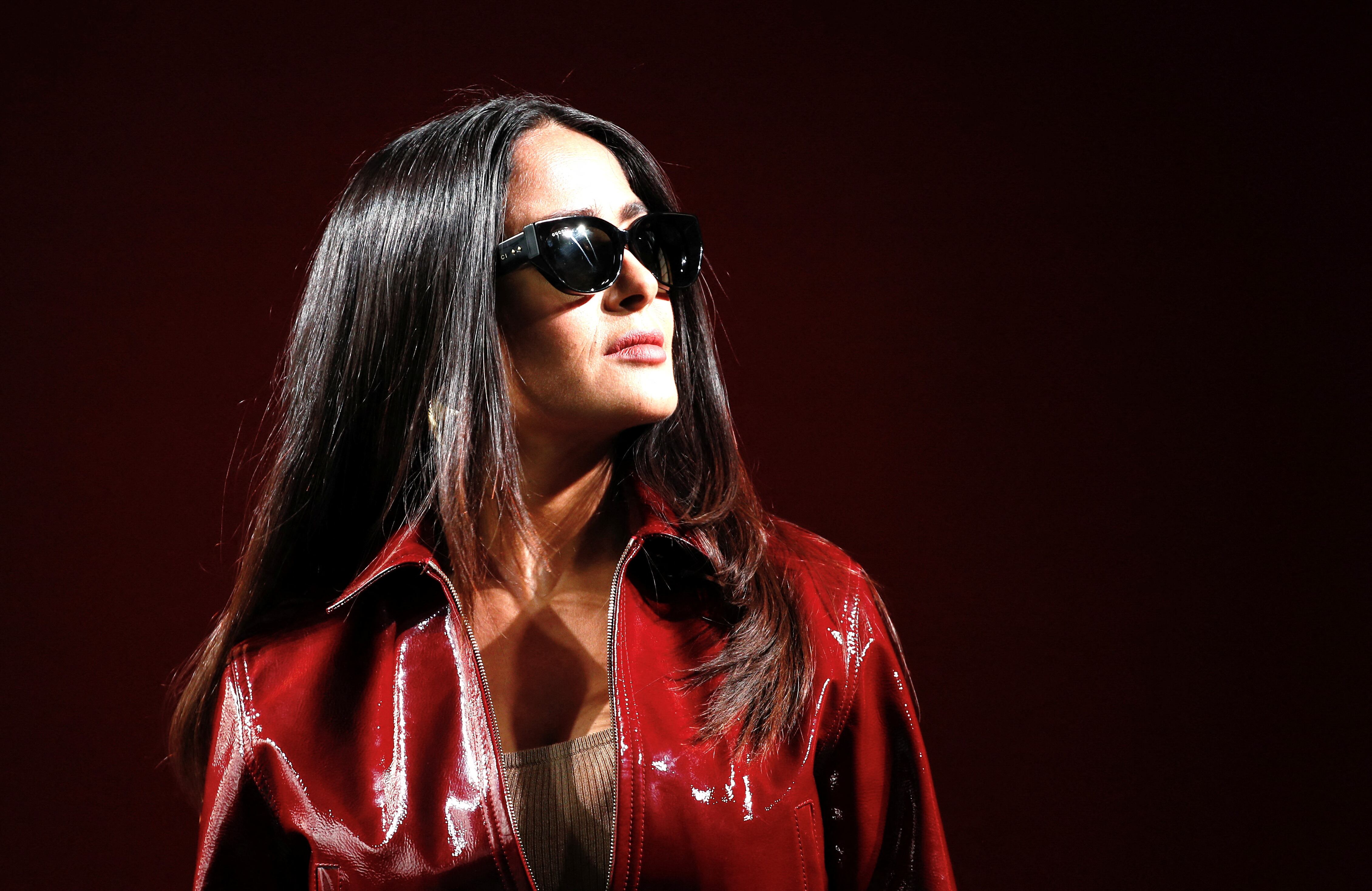 Actor Salma Hayek poses before a fashion show for the Gucci Fall/Winter 2024 collection during Fashion Week in Milan, Italy, February 23, 2024. REUTERS/Alessandro Garofalo