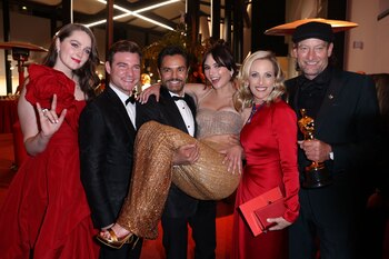 Best Supporting Actor Troy Kotsur poses with the cast of "CODA", Marlee Matlin, Eugenio Derbez, Emilia Jones, Amy Forsyth, and Daniel Durant at the Governors Ball following the 94th Academy Awards in Los Angeles, California, U.S., March 27, 2022. REUTERS/Mike Blake