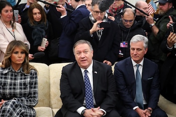 Melania Trump y Mike Pompeo