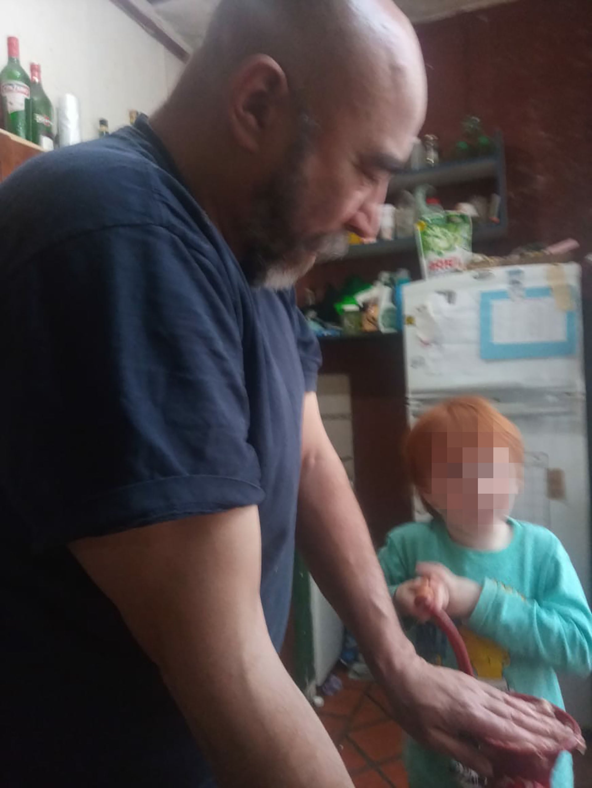 Marcelo y L. cocinando churros