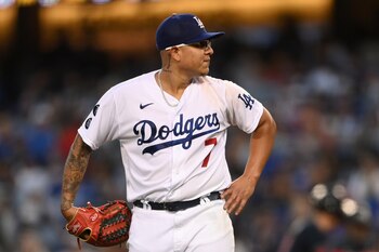 Oct 20, 2021; Los Angeles, California, USA; Los Angeles Dodgers starting pitcher Julio Urias (7) reacts in the third inning against the Atlanta Braves during game four of the 2021 NLCS at Dodger Stadium. Mandatory Credit: Jayne Kamin-Oncea-USA TODAY Sports