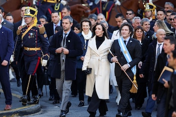 Argentina's President Javier Milei walks