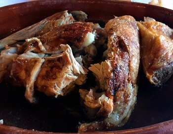 Ración de cordero lechal asado