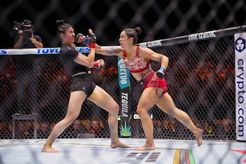 Sep 14, 2024; Las Vegas, Nevada, USA; Irene Aldana of Mexico (red gloves) fights Norma Dumont of Brazil (blue gloves) during Riyadh Season Noche UFC 306 at The Sphere. Mandatory Credit: Stephen R. Sylvanie-Imagn Images