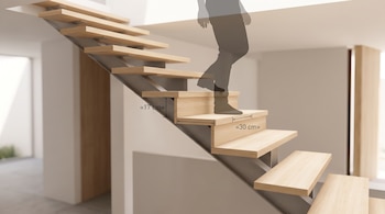 Escalera recta con peldaños de madera, cotas de 17 y 30 centímetros y una silueta humana que pisa un escalón al descender.