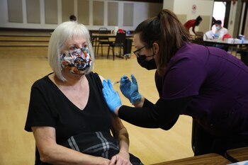 FILE -- A person receives