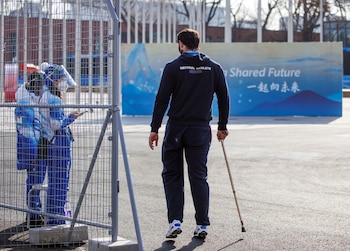 Beijing 2022 Winter Paralympic Games - Beijing 2022 Winter Paralympic Games Preview - Paralympic Village, Beijing, China - March 3, 2022. A neutral athlete of the Russian Paralympic Committee leaves the Paralympic Village after the IPC announcement that athletes from the Russian Paralympic Committee and Belarus are no longer allowed to compete at the games. Chloe Knott/OIS/Handout via REUTERS THIS IMAGE HAS BEEN SUPPLIED BY A THIRD PARTY.
