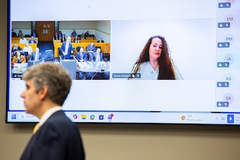 FILE — Christa Pike attends a hearing via a video hookup at Knox County Criminal Court in Knoxville, Tenn., Aug. 11, 2026. A federal court on Wednesday, Sept. 30, ordered a pause on the execution of Pike, convicted of the torture and murder of a classmate in 1995, just hours before she was set to die by lethal injection in Nashville. (Jessica Tezak/The New York Times)