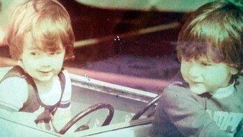 Christian Sancho (derecha) junto a