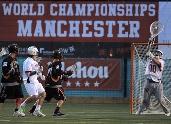 England play Germany during the opening game of the world lacrosse championships in Manchester north-west England, on July 15, 2010. England were due to play the Iroquois in the opening game but due to visa problems they failed to arrive in time. AFP PHOTO/ANDREW YATES (Photo credit should read ANDREW YATES/AFP/Getty Images)