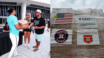 Caja de fideos, personas. Pallet con bandera estadounidense, logos de Houston Astros, GEM, The Astros Foundation. Pesa 1409 libras, etiqueta MIA-CCS