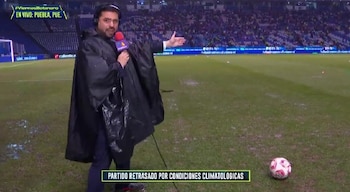 El reportero fue captado micrófono