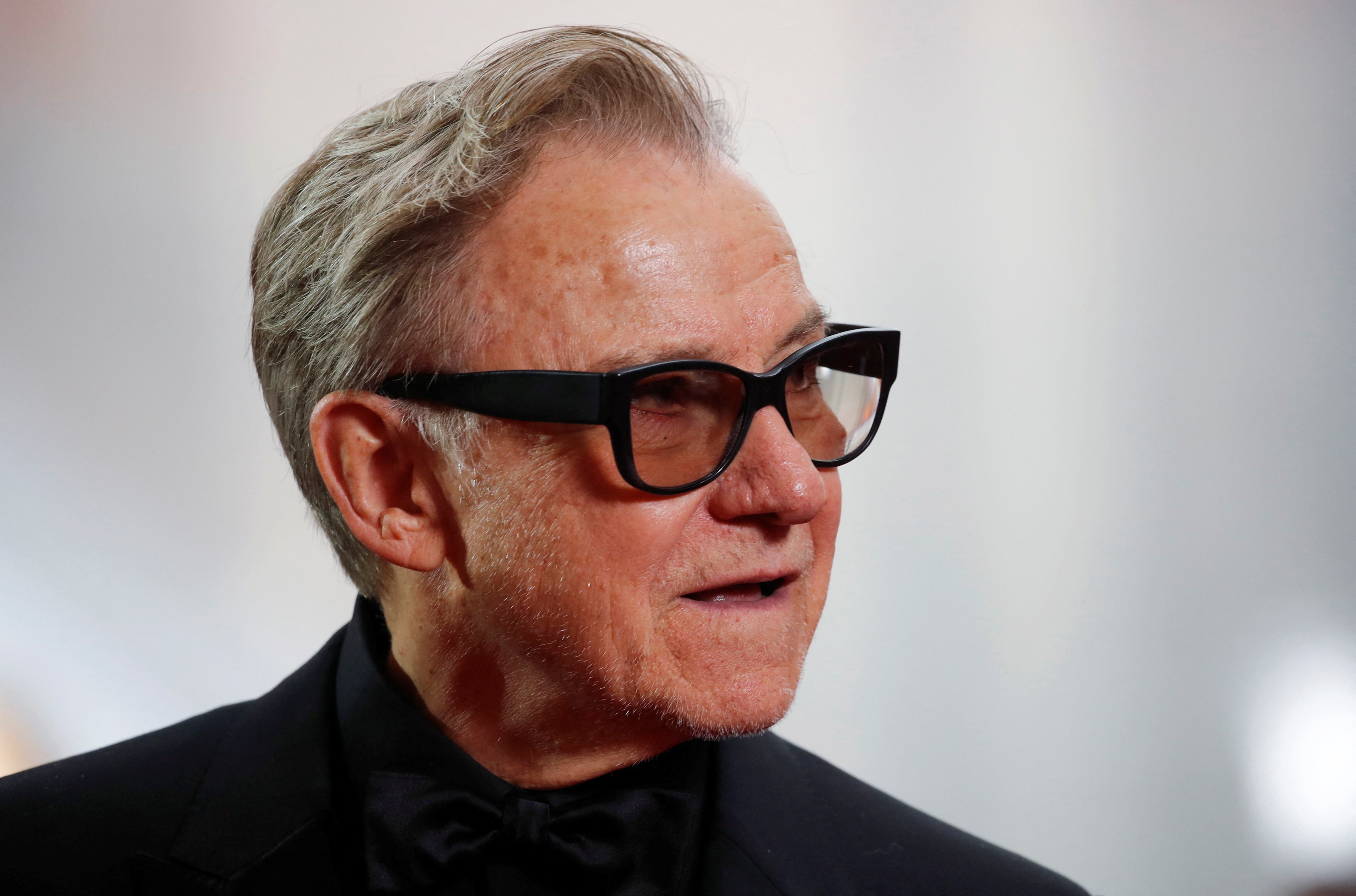 FILE PHOTO: Harvey Keitel poses on the red carpet during the Oscars arrivals at the 92nd Academy Awards in Hollywood, Los Angeles, California, U.S., February 9, 2020. REUTERS/Mike Blake/File Photo