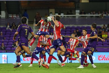 Aug 4, 2024; Orlando, Florida, USA; Atletico de San Luis defender Julio Cesar Dominguez Juarez (4) heads the ball against Orlando City in the second half during the Leagues Cup group stage at INTER&CO Stadium. Mandatory Credit: Nathan Ray Seebeck-USA TODAY Sports