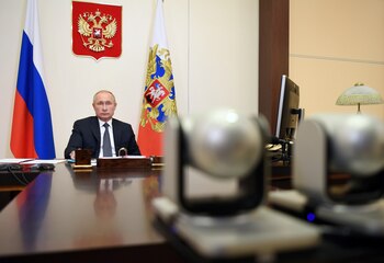 Russian President Vladimir Putin chairs