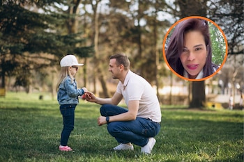 un padre y su hija en el parque