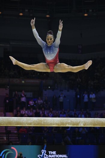 Jordan Chiles, performs her beam