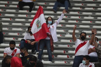 Soccer Football - World Cup - South American Qualifiers - Peru v Bolivia - Estadio Nacional, Lima, Peru - November 11, 2021 Peru fans in the stands before the match Pool via REUTERS/Sebastian Castaneda