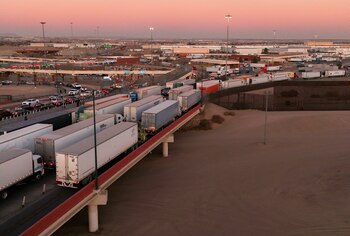 A drone view shows trucks waiting in line at the Zaragoza-Ysleta border crossing bridge to cross into the U.S., as new tariffs are expected soon from U.S. President Donald Trump, in Ciudad Juarez, Mexico January 31, 2025. REUTERS/Jose Luis Gonzalez