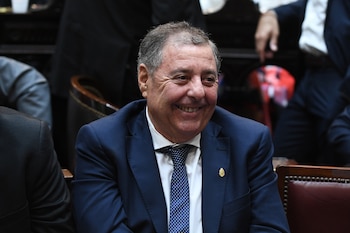 Alfredo de Angeli con saco