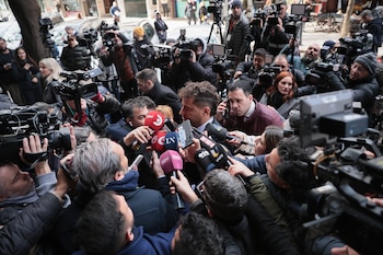 El fiscal Ferrari rodeado por