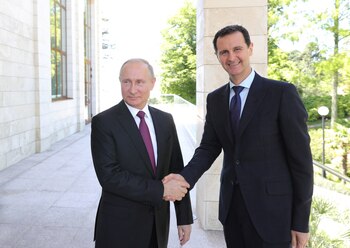 El presidente ruso, Vladímir Putin, recibe al presidente sirio, Bashar al Assad, en 2018 (Sputnik/Mikhail Klimentyev/Kremlin vía REUTERS)