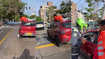 Domiciliario de Barranquilla terminó sobre el techo de un vehículo por un pedido, conductora se defendió en redes: “Eso es una pandilla”