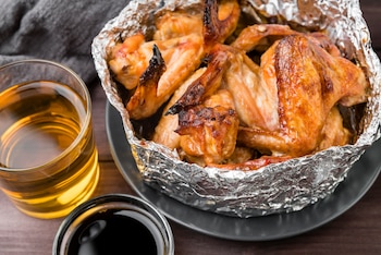 Alitas de pollo al horno con ajo y vino blanco (Magnific)