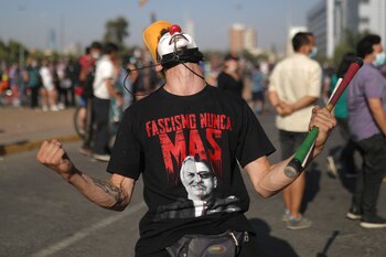 A demonstrator wears a t-shirt