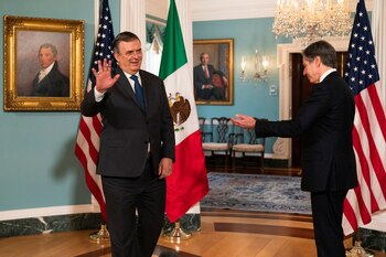 U.S. Secretary of State Antony Blinken and Mexico's Foreign Minister Marcelo Ebrard, wave after speaking to reporters at the State Department Treaty Room in Washington, U.S., May 3, 2022. Manuel Balce Ceneta/Pool via REUTERS