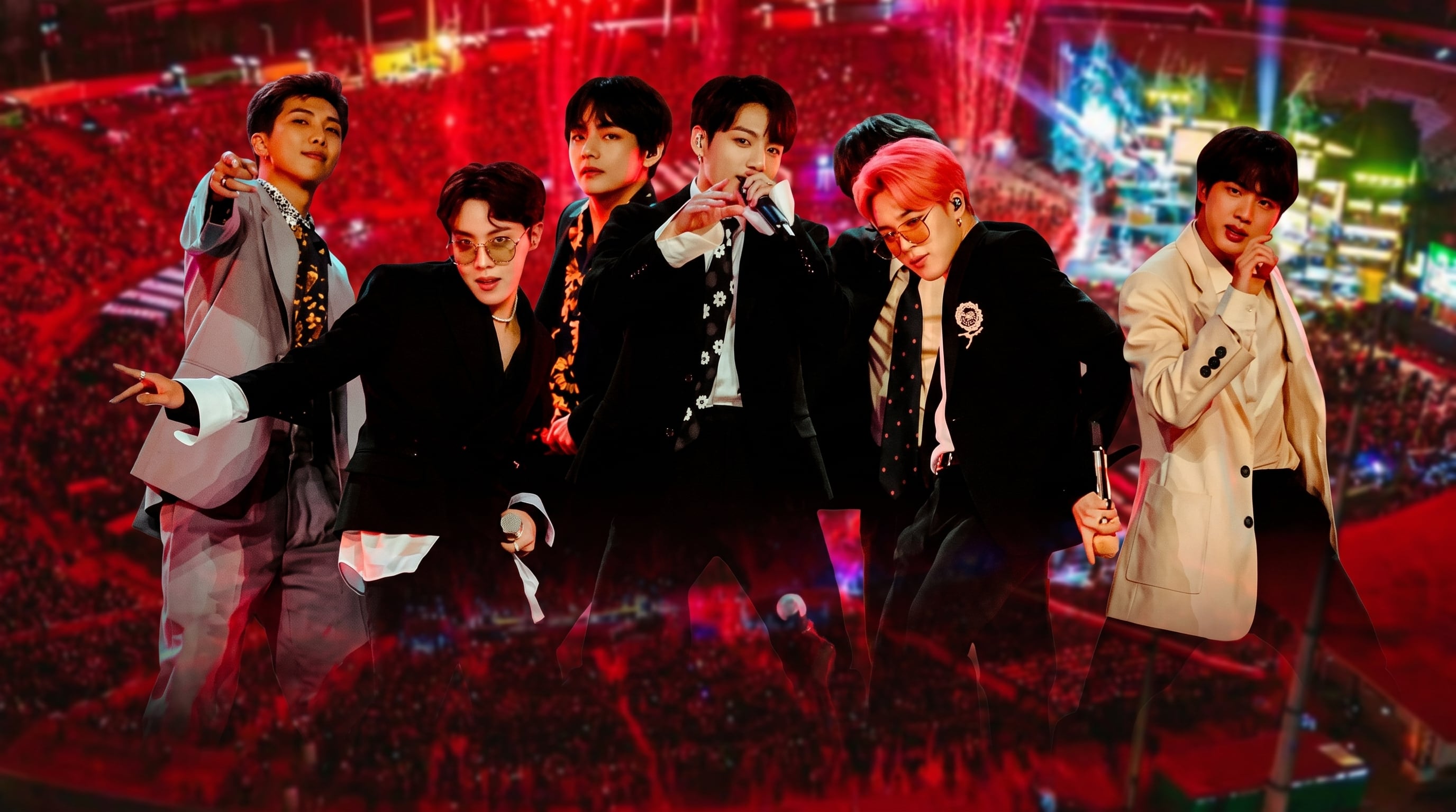 Los integrantes del grupo musical BTS aparecen trajeados en primer plano sobre la imagen difuminada de un estadio repleto de espectadores durante un concierto. (Imagen Ilustrativa Infobae)