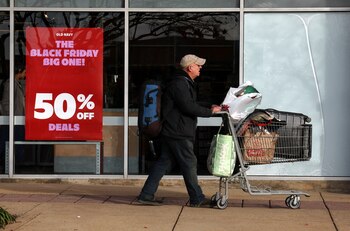 A pedestrian walks past a