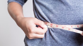 Woman Checking Waistline