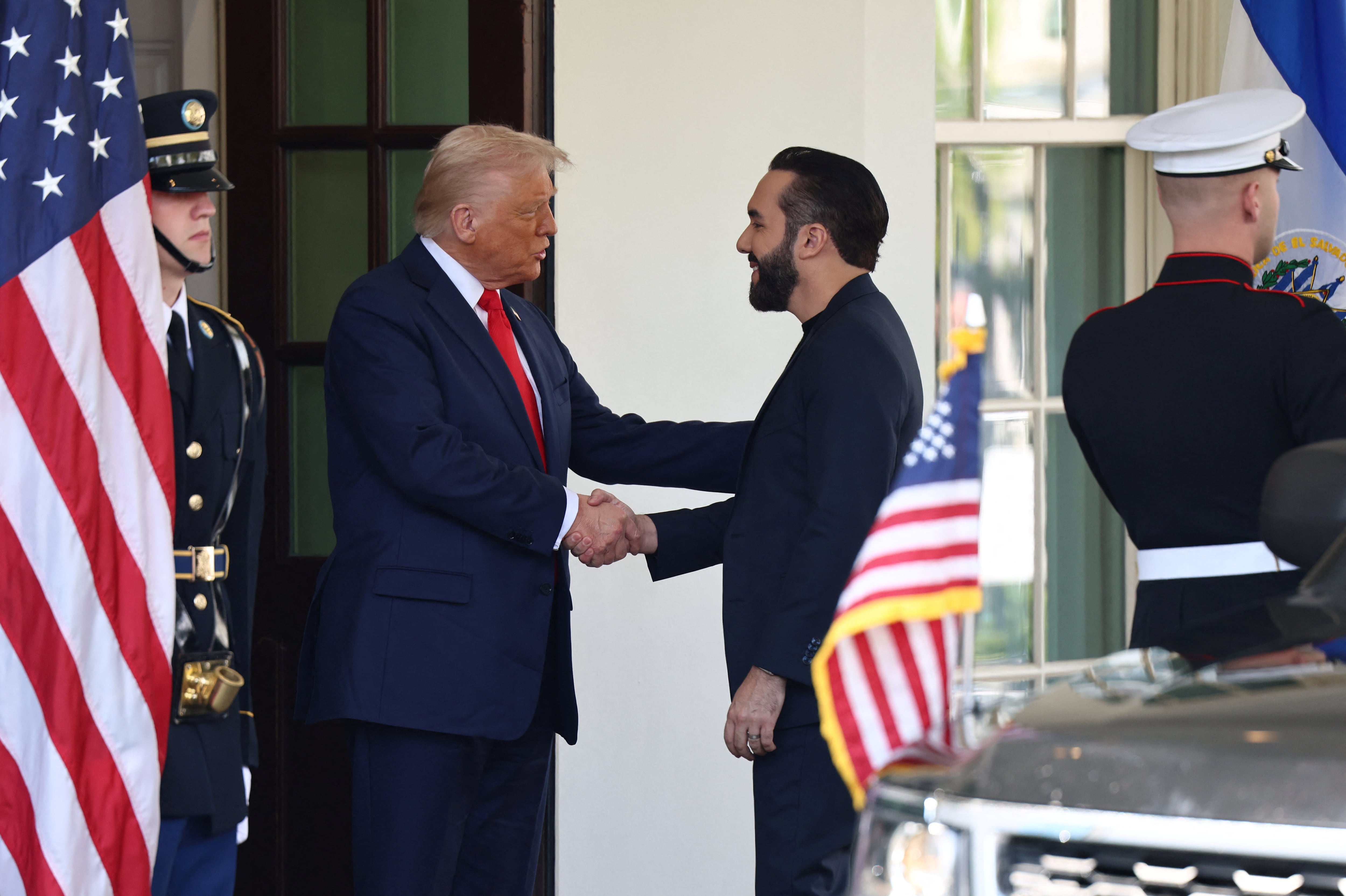 U.S. President Donald Trump welcomes El Salvador's President Nayib Bukele at the White House in Washington, D.C., U.S., April 14, 2025. REUTERS/Evelyn Hockstein