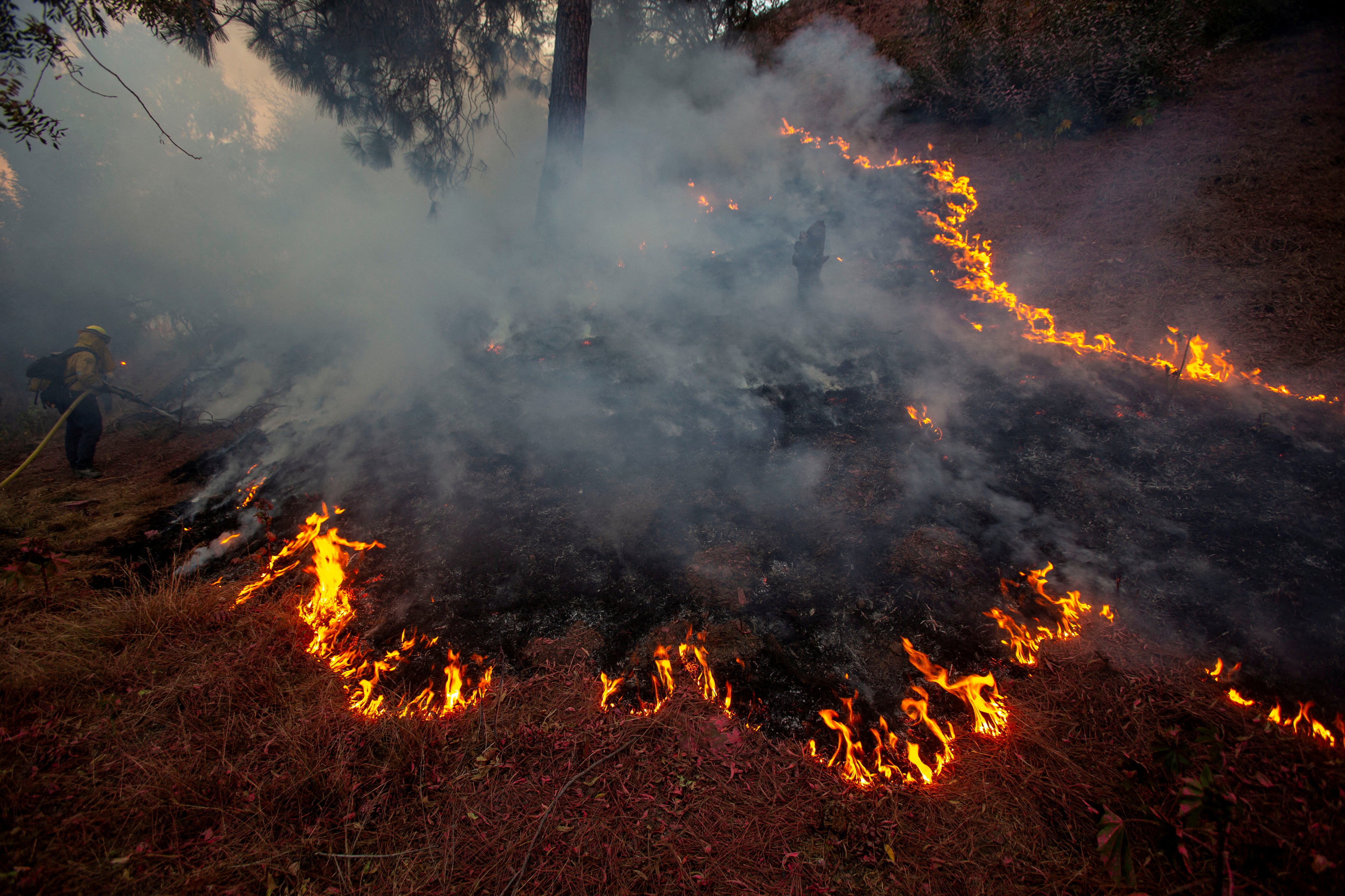 Los incendios de enero desviaron recursos y atención clave, justo cuando se acelera la preparación para el evento. (REUTERS/Ringo Chiu)