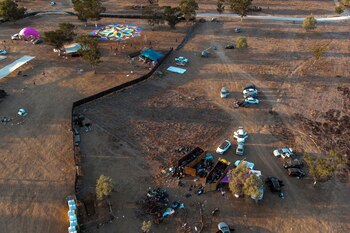 An aerial view shows abandoned cars of festival-goers at the site of an attack on the Nova Festival by Hamas gunmen from Gaza, near Israel's border with the Gaza Strip, in southern Israel, October 12, 2023. REUTERS/Ilan Rosenberg