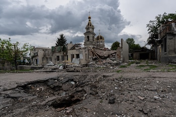 This photo provided by Ukraine's 93rd Kholodnyi Yar Separate Mechanized Brigade press service and taken Saturday, July 25, 2026, shows the damaged center of the frontline town of Druzhkivka, Donetsk region, Ukraine. (Iryna Rybakova/Ukraine's 93rd Mechanized Brigade via AP)