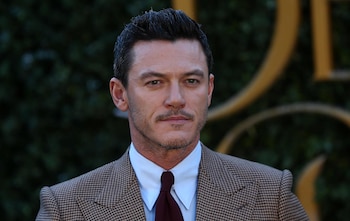 Actor Luke Evans poses for