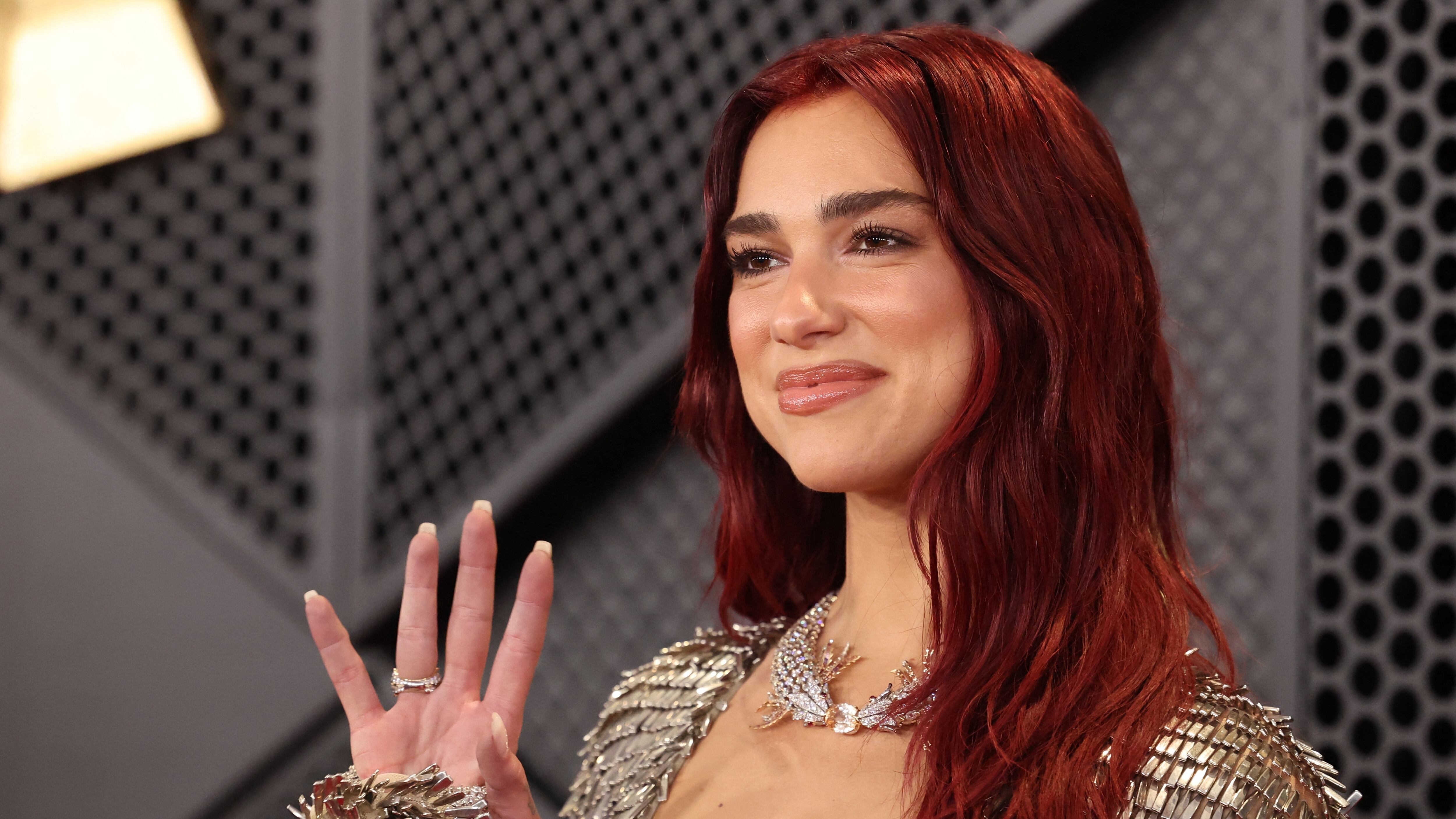 Dua Lipa poses on the red carpet as she attends the 66th Annual Grammy Awards in Los Angeles, California, U.S., February 4, 2024. REUTERS/Mario Anzuoni