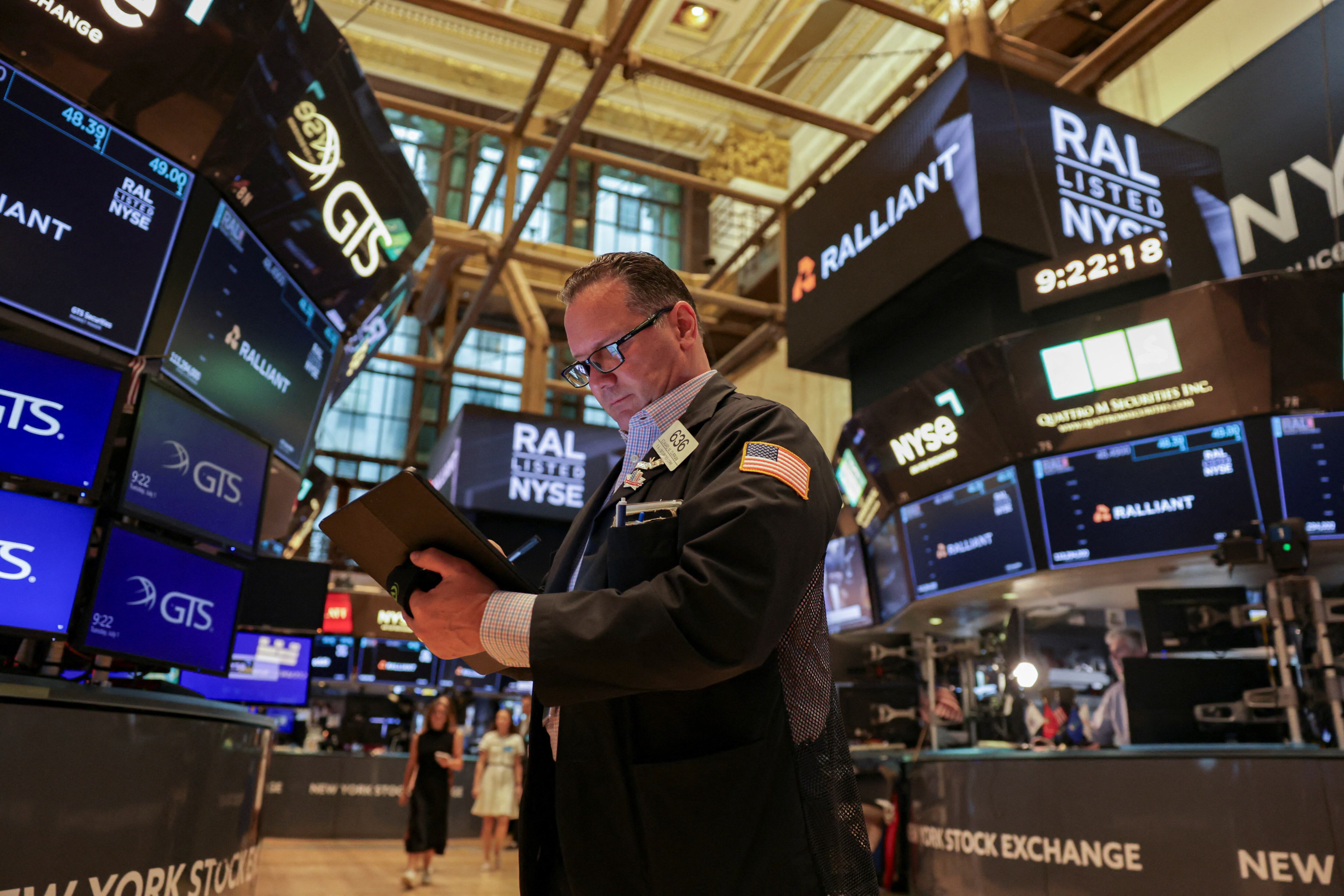 A trader works on the floor at the New York Stock Exchange (NYSE) in New York City, U.S., July 1, 2025. REUTERS/Jeenah Moon